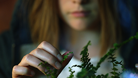 Alix (Olive Black) and their spirit plant Cordelia in Weedling